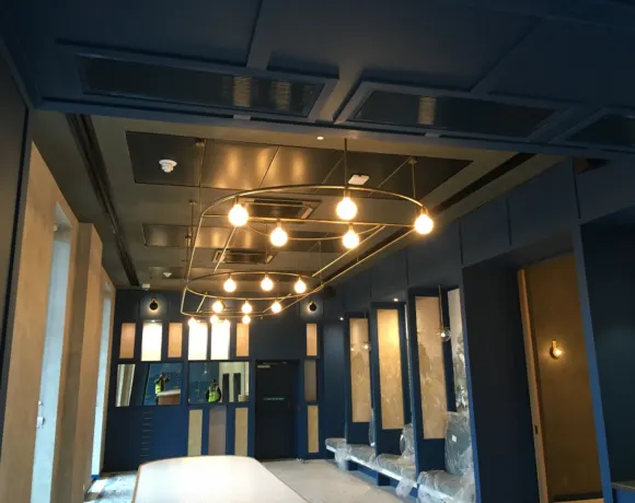 Dry-lining partitions under construction on a commercial site