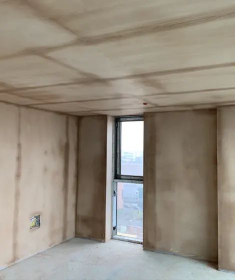 Freshly plastered walls in a new-build interior