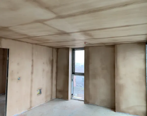Freshly plastered walls in a new-build interior
