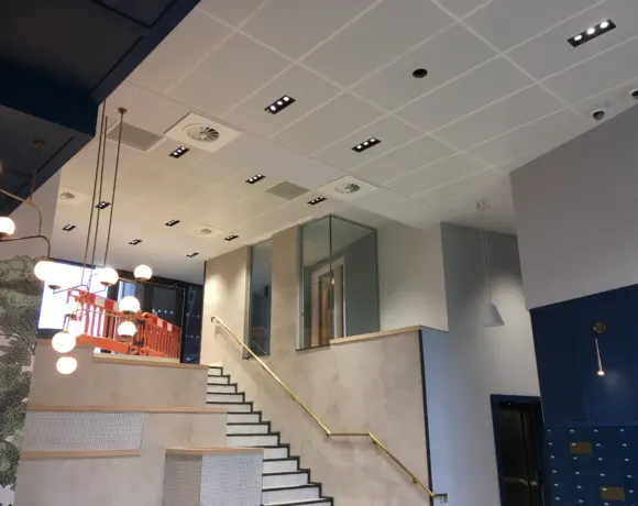 Suspended ceiling grid being installed